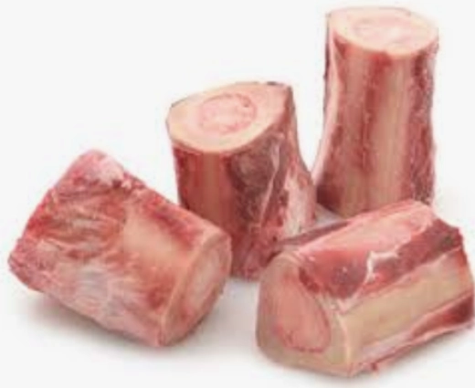Raw beef marrow bones on white background.