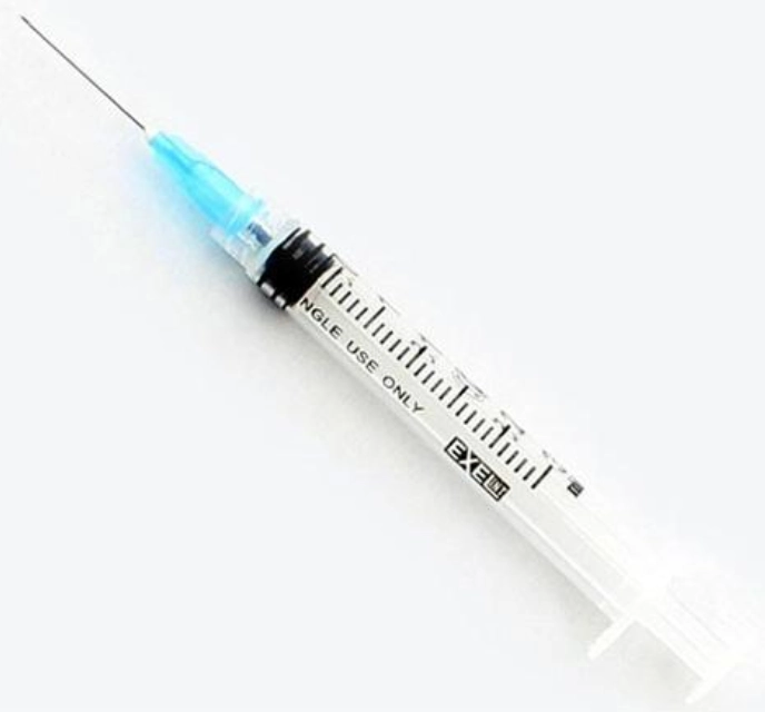 Medical syringe with needle on white background. Medical syringe with needle on white background.